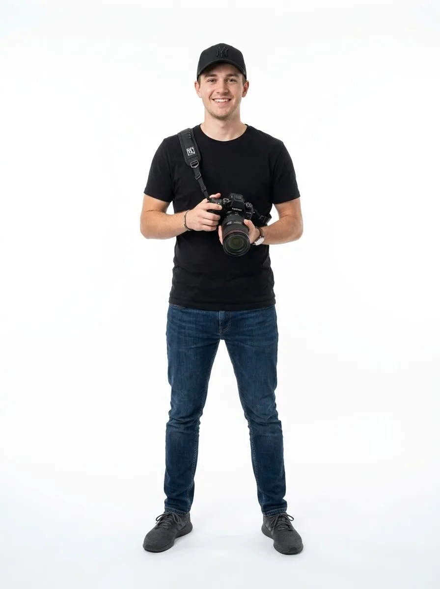 Lead photographer at Click Production holding a camera